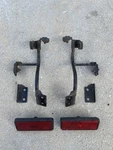 2014 Can-am DS90 Front Headlight Lamp Bracket Support Reflectors Lights Pair Use. Fixed Price $45.00.