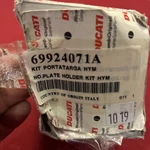Plate Holder Ducati Hypermotard 1100 2010 2012 New And Genuine- 69924071A 1-B3. Fixed Price $139.00.