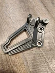 1994 Kawasaki Ninja EX250 Front Left Footrest Bracket 35063-0079. Fixed Price $15.00.