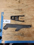 Suzuki 2002 DL1000 Chain Guard 61310-34E00 And Slider Buffer 61273-06G00. Fixed Price $45.00.