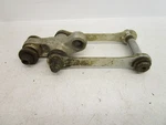 1990-1999 Suzuki Rear Shock Linkage 62602-14850. Fixed Price $40.00.