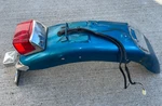 1992-2004 Suzuki Intruder Rear Wheel Fender Tin Cover Taillight. Fixed Price $94.25.