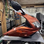 2004 Suzuki SV1000 Front Upper Fairing Cowl, Headlamp, Gauge Cluster & Bracket. Fixed Price $400.00.