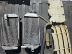 Oem 07-25 Honda CRF150RB Radiator Left Right Set Cap Guards Covers Fins. Fixed Price $80.00.