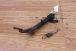 2006 Suzuki GZ250 Kick Stand Side W/ Spring. Fixed Price $24.00.