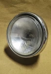 86-87 Honda Shadow VT700C Headlamp Assembly, Includes Mounting Bracket. Fixed Price $50.00.