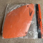 Genuine Ktm 5030804100004 Side Cover Left Orange Mxc Exc Sx 125. Fixed Price $19.00.
