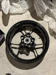 2014 RSV4 Rear Wheel (black) Straight Oem. Fixed Price $325.00.