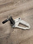 2006 Kawasaki Ninja EX250 Front Left Footrest Bracket 35063-0079 With Peg. Fixed Price $20.00.